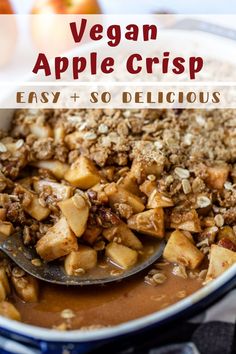 an apple crisp in a bowl with spoon