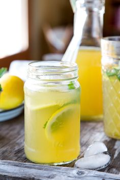 a mason jar filled with lemonade and lime