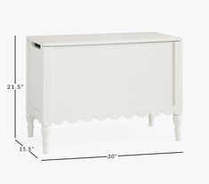 a white cabinet with scalloped legs and measurements for the bottom section, side view