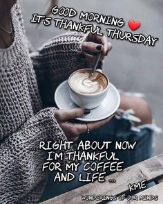 a woman holding a cup of coffee with the words good morning, it's thanksgiving