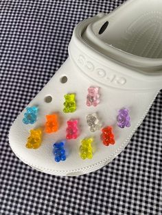 Customise your Crocs with these Clear Gummy Bear Croc Charms! Made here in our Funky Crocs studio and tested for wear and durability, this charm will last you through many adventures! Perfect to keep for yourself, or to gift to the Croc lover in your life. Limited quantities available. White not pictured but it is a solid white not a clear white.  This listing is for one (1) charm.  Mystery Charm GWP included in every order :) Croc Pins, Croc Shoe Charms, Custom Charms, Gummy Bear, Clear White, Shoe Clips, Gummy Bears