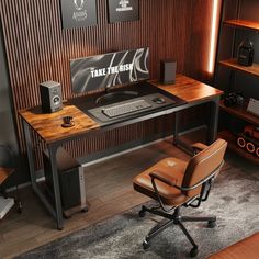 a desk with a computer and speakers on it