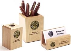 wooden pen holder with business cards and starbucks logo on the front, along with two matching cup holders