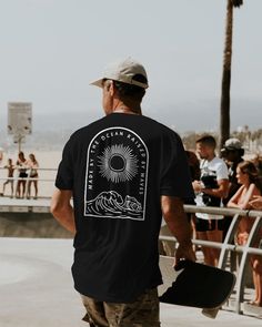 Time to get stoked with this epic shirt. ↪ From Europe? Order here https://www.surfersartshop.com/products/raised-by-the-ocean-shirt ↪ See the faces behind on Instagram @surfersartshop   PRODUCT DESCRIPTION  - Luxurious comfort and style are what this unisex, garment-dyed shirt is all about - The unisex soft-style t-shirt puts a new spin on casual comfort - Made from very soft materials, this tee is 100% cotton for solid colors - The shoulders have twill tape for improved durability - There are Surfing Crew Neck T-shirt With Front Print, Black Surfing T-shirt With Screen Print, Casual Pre-shrunk Surfing T-shirt, Casual Pre-shrunk T-shirt For Surfing, Casual Surfing T-shirt With Back Print, Surfing T-shirt With Front Print And Short Sleeves, Surfing Graphic Print Crew Neck T-shirt, Graphic Tee T-shirt With Front Print For Surfing, Black Graphic Tee For Surfing