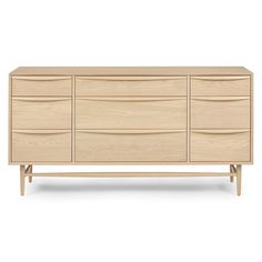 the sideboard is made from wood and has four drawers