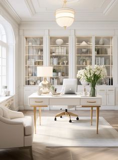 a white room with two chairs and a desk