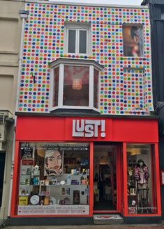 a colorful building with lots of windows on it