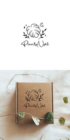 the logo for an organic product is shown on top of a box with flowers in it