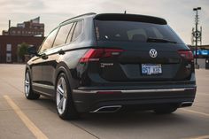 the back end of a black volkswagen suv