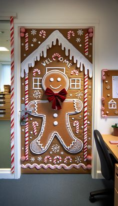 an office decorated with gingerbread man and candy canes on the front door for christmas