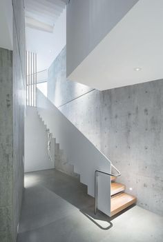 an empty staircase in a concrete building