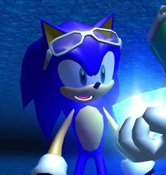 sonic the hedgehog holding up a nintendo wii game controller in front of a blue background