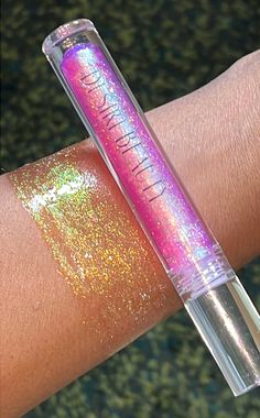 A statement, high-shine, holographic lip gloss that's super hydrating. It comes well packaged in a box. This holographic gloss will shine with or without illumination. A Perfect gift for graduation, birthdays, Anniversary, weddings, Christmas gift etc Astral Pink-  A Multichrome Holo- Shifts from pink to blue to gold * Smooth velvety texture  * Long wear * Glossy finish * Unscented * Cruelty Free Vegan Formula Processing: 1 business day Ingredients; POLYISOBUTENE, PARAFFINUM LIQUIDUM, OCTYLDODEC Holographic Lips, Gift For Graduation, Glitter Gloss, Lip Balm Gloss, Lip Liner, Makeup Nails, Makeup Cosmetics, Nails Inspiration, Lip Balm