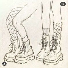 the legs and feet of two people wearing boots with laces on them, standing next to each other