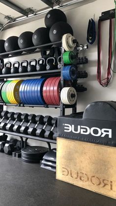 there are many rows of dumbs in the gym, and one is for sale