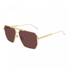 Step out in style with these luxurious Bottega Veneta BV1012S 005 Gold/Red sunglasses from OSSA FRAMES. Crafted with precision and attention to detail, these aviator-style frames are sure to elevate your look to new heights. The stunning gold frame exudes sophistication and elegance, making a bold statement wherever you go. Paired with vibrant red lenses, these sunglasses are not just a fashion accessory, but a work of art. The lens socket width of 60 ensures a comfortable fit for both men and w Athleisure Outfits Summer, Cool Silhouettes, Black Round Sunglasses, Green Accessories, Red Sunglasses, Pilot Sunglasses, Aviator Style, Athleisure Outfits, Gold Sunglasses