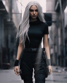 a woman with long white hair and black pants is walking down the street in an urban setting