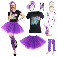 a woman wearing purple tutu skirt and matching t - shirt is posing for the camera