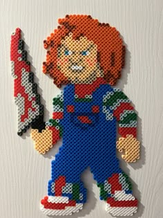 an image of a pixellated toy made to look like it is holding a knife