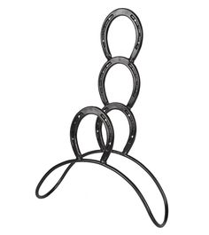 a metal sculpture with four rings on it's sides and one ring in the middle