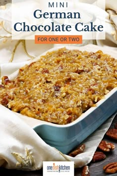 a close up of a casserole dish with pecans on the side and text overlay reading mini german chocolate cake for one or two