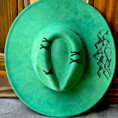 This Custom Boho Hat Is Made Uniquely Yours Mountains Have Been Burned Beautifully Into The 9 1/2 Inch Brim, And Will Stand Out In Any Crowd. Green Wide Brim Felt Hat For Beach, Adjustable Green Felt Hat For Beach, Green Wide Brim Felt Hat For Festival, Green Short Brim Hat Bands For Rodeo, Green Hat Bands For Rodeo With Short Brim, Green Fedora Hat For Rodeo, Green Rodeo Hat One Size Fits Most, Handmade Green Rodeo Hat, Boho Wedding Hat