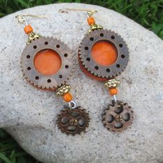 Hand Crafted Tangerine With Bronze-Tone Gears Lightweight Steampunk Dangle Statement Pierced Earrings New With Tags - Designed & Handmade By Me Alex 8 Essential Earrings For Anyone With Modern Victorian, Eclectic, Hippy, Flower Child, Boho, Gypsy Or Festival Tastes One Of A Kind Style To Elevate Your Mood & Outfit - Vintage Vibes With A Contemporary Twist Tangerine Orange Base With Antique Brass Tone Gear Overlay & Dangles Gold Tone Metal Findings Detail Amazingly Lightweight High Quality & Dura Handmade Orange Copper Earrings, Unique Orange Metal Earrings, Orange Metal Earrings, Nickel-free Orange Earrings For Festival, Orange Festival Earrings For Pierced Ears, Unique Orange Earrings For Festival, Orange Metal Pierced Earrings, Orange Pierced Metal Earrings, Victorian Eclectic