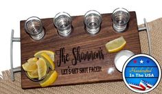 a wooden sign with glasses and lemons on it that says, the showroom lets's set sail back in the usa