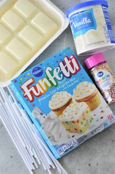 cupcakes, vanilla ice cream and funfetti are laid out on the counter