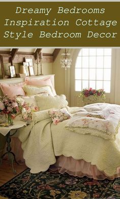 a bed with white comforter and pink flowers on the pillow in front of it