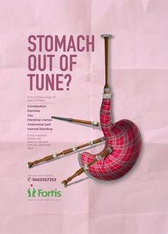 a pink poster with the words stomach out of tune? and an image of two musical instruments