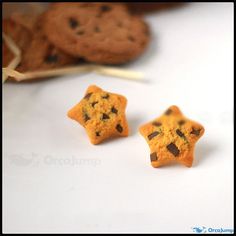 two cookies with chocolate chip stars on them