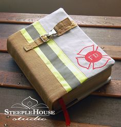 an open book sitting on top of a wooden table