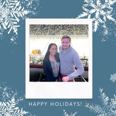 a man and woman standing next to each other in front of snowflakes with the words happy holidays written on it