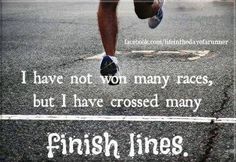 a man is running down the street with a quote on it that says, i have not won many races, but i have crossed many finish lines