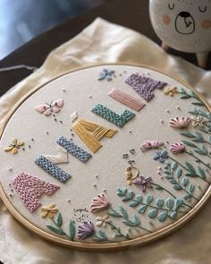 a close up of a embroidery on a table