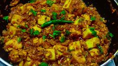 the food is prepared and ready to be cooked in the pan on the stove top