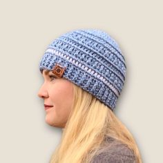 Winter Light Blue and White textured women's beanie hat. This hat is thick, and soft! This hat is made with 100% Acrylic yarn. You'll be sure to stay warm and look great wearing this hat! Care: Machine wash and dry.  Refunds and Exchanges I gladly accept returns or exchanges. I want you to be happy with your purchase, so please contact me within 7 days after delivery if there is an issue with your item and I will work with you to return or exchange. Returns and exchanges must be shipped back wit Blue Beanie Hat For Winter, Warm Blue Beanie Hat, Blue Outdoor Beanie Hat, Outdoor Blue Beanie Hat, Blue Brimmed Hat For Winter, Blue Brimmed Winter Hat, Blue Crochet Beanie For Cold Weather, Adjustable Blue Beanie Hat, Blue Beanie Hat One Size Fits Most