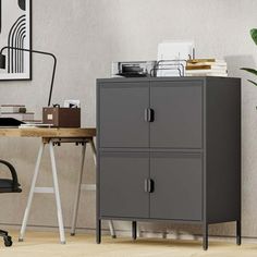 a gray filing cabinet sitting next to a desk