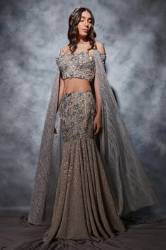 Buy Grey Crinkled Sequin Heavy Georgette Embroidered Thread Mermaid Lehenga Set For Women by Saaj by Ankita Online at Aza Fashions. Mermaid Lehenga, Embroidered Mermaid, Sequin Lehenga, Lehenga Pattern, Reception Outfit, Crystal Embroidery, Bollywood Outfits, Silver Mermaid, Cape Sleeves