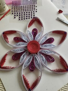 the paper is cut out to look like a flower