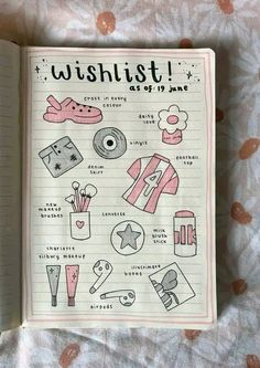 an open notebook with drawings on it and the words wishlist written in black ink