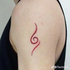 a woman's arm with a tattoo on it that is shaped like a spiral