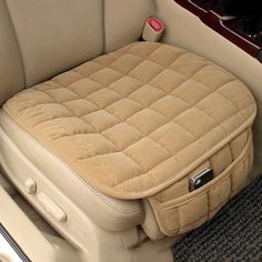 an inflatable car seat sits on the floor