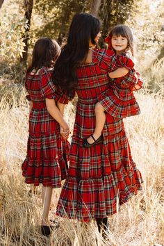 Flowy, darling, and winter princess approved. Everything this carefree midi-length girl's dress is made of. Inspired by holiday parties, family time, and playing with cousins or friends. Featuring a smocked bodice with puff sleeves, square neckline and ruffle detailing. Available for a limited time in our favorite festive print...HOLIDAY PLAID! Plaid Christmas Dress, Winter Princess, Christmas Outfits Women, City Woman, Holiday Plaid, Tiered Ruffle Skirt, Christmas Outfits, Tea Length Dresses, Tier Skirt