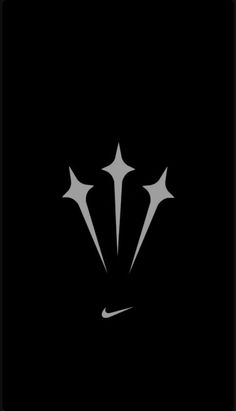 the nike logo is shown in black and white, with three pointed stars on it