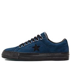 We're excited to introduce the thisisneverthat x Converse One Star Low 'New Vintage'! The shoe features a blue premium nubuck upper with a low-cut collar lined in black leather. The black One Star logo, chrome eyelets and dual-branded woven tongue tag give the shoe an edgy look that is sure to turn heads. The low-top is mounted on a distressed black rubber midsole with throwback embossed-star detailing on the toe bumper. Underfoot, a turquoise rubber outsole delivers an unexpected pop of color.W Black Skate Shoes, Converse Low Tops, Fur Sweater, Converse One Star, Star Logo, Round Toe Heels, One Star, Edgy Look, Black Rubber