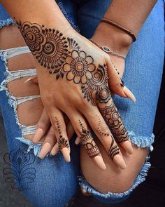 henna tattoo on someone's hand