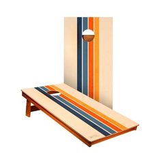 a cornhole game set with an orange, blue and yellow striped board on it