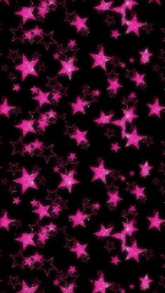 many pink stars are in the dark sky